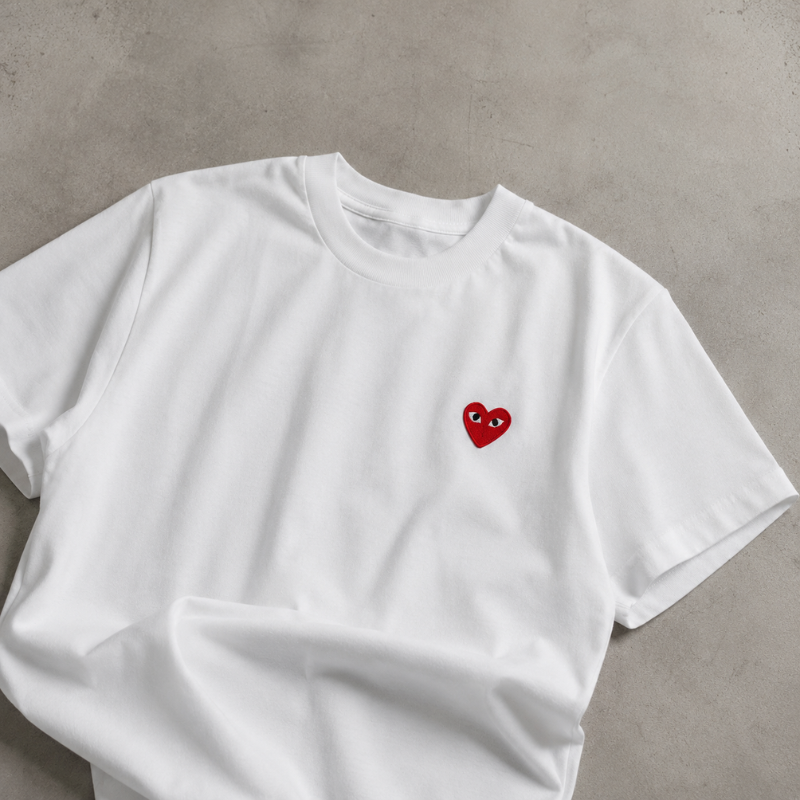 CDG Play white t-shirt with red heart emblem on left chest