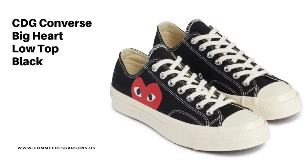 Black CDG Converse Chuck 70 low-top sneakers featuring the signature oversized red Comme des Garcons PLAY heart graphic.