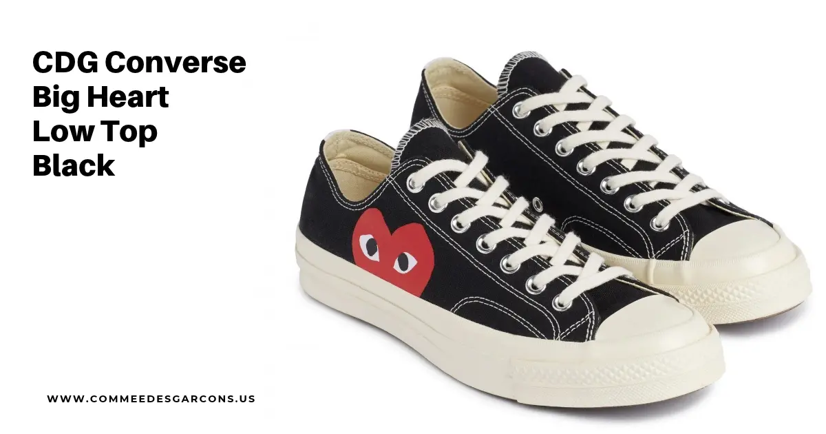 Black CDG Converse Chuck 70 low-top sneakers featuring the signature oversized red Comme des Garcons PLAY heart graphic.